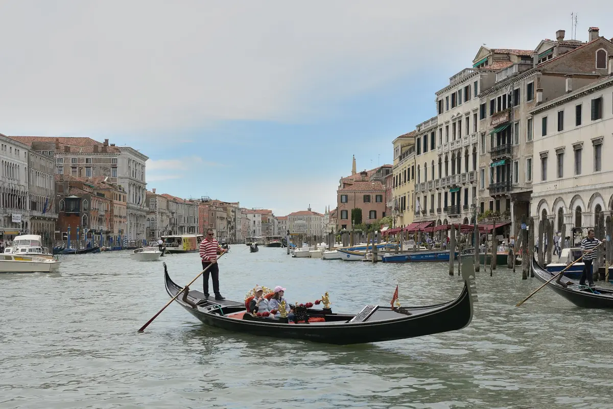 A gondola with passengers on the Grand Canal